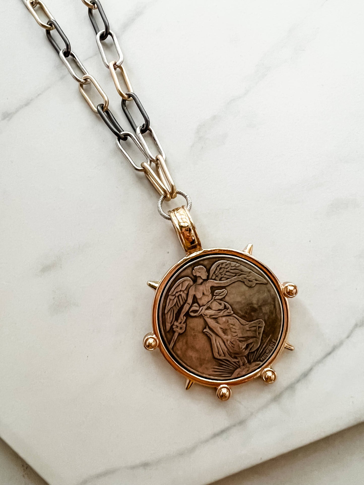 Artifact Necklace: Victory Medal