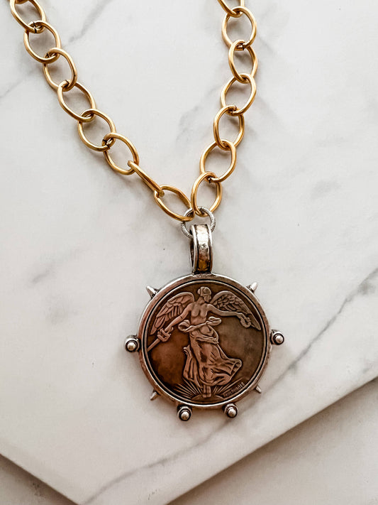 Artifact Necklace: Victory Medal